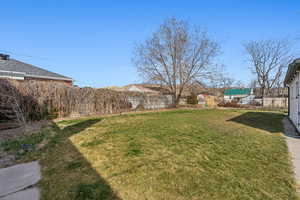 Expansive yard with garden space or potential to add an accessory dwelling unit.