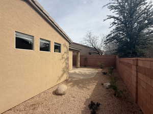 View of yard featuring a patio and a fenced backyard