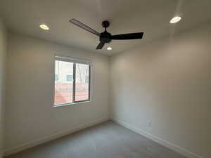 Unfurnished room featuring light carpet, recessed lighting, baseboards, and ceiling fan