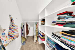 Spacious walk in closet.