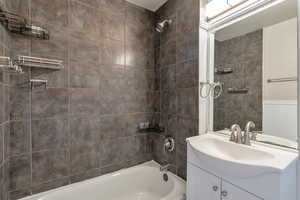 Full bath with tub / shower combination and vanity