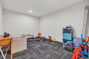Playroom featuring carpet flooring, recessed lighting, and baseboards