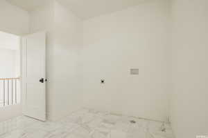 Empty room with marble finish floor and baseboards
