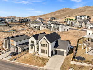 Bird's eye view featuring a mountain view and a residential view