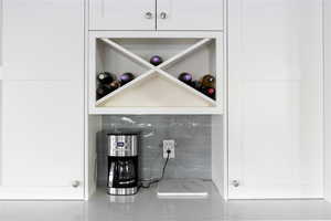 View of wine shelves and coffee nook.