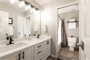 Full Bathroom with double vanity.