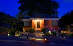 View of front of house featuring ambiance lighting