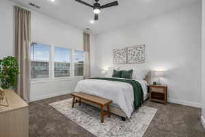 Primary bedroom featuring private en suite and walk in closet