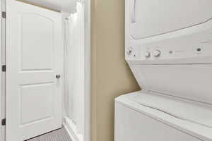 In unit and included stacking washer and dryer!