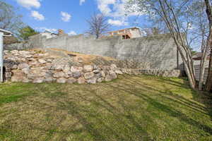 View of yard featuring a fenced backyard