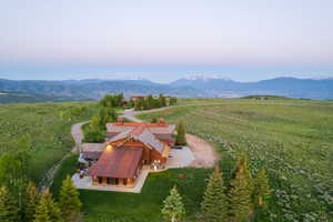 Overview of rural landscape featuring a mountainous background
