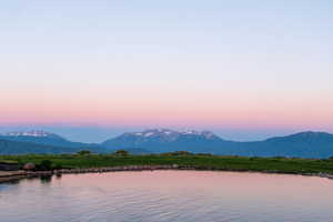 Water view with a mountainous background