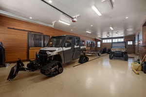 Garage featuring a garage door opener