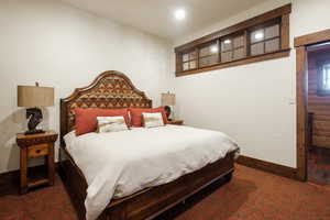 Bedroom featuring baseboards and recessed lighting