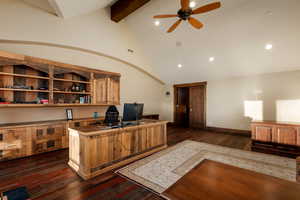 Office area with high vaulted ceiling, dark wood finished floors, beam ceiling, recessed lighting, and a ceiling fan