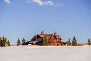 View of front of property with a chimney