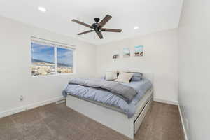 Carpeted bedroom with visible vents, recessed lighting, baseboards, and ceiling fan
