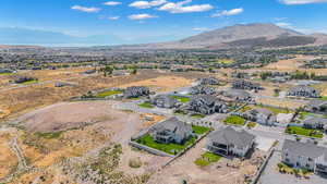 Aerial view of residential area with a mountain backdrop