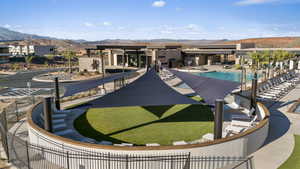 Pool featuring a mountain view, a patio, and fence