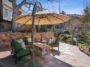 Sandstone patio overlooking lush backyard