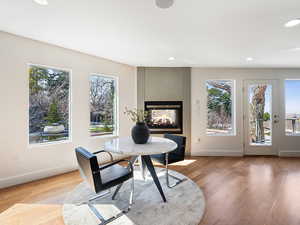 Semi-formal dining area.  Double sided gas fireplace.  Access to trex deck and backyard.