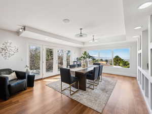 Formal dining room with views!  Access to trex deck. Walnut floors and built-ins.