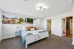 Bedroom with two walls of windows