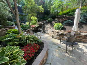 Quiet spot with summer color and the sounds of the nearby waterfall