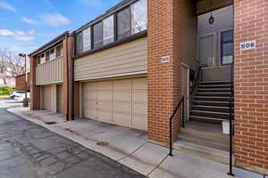 Exterior space with brick siding and driveway