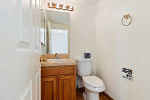 Bathroom featuring toilet and vanity