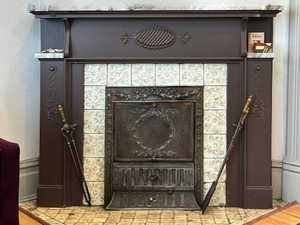 Details with a tile fireplace