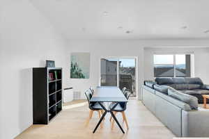 Dining room featuring visible vents and light wood finished floors
