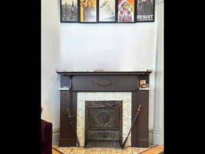 Details with a tile fireplace