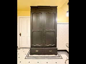 Room details with a wainscoted wall