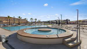 View of swimming pool with fence