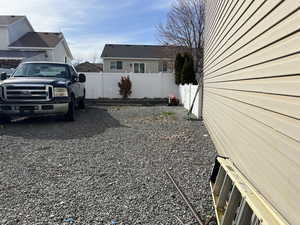 View of yard featuring a fenced backyard