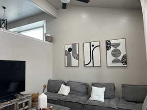 Living area featuring ceiling fan