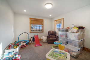 Rec room featuring recessed lighting, carpet, and baseboards