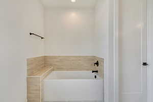 Bathroom featuring a garden tub