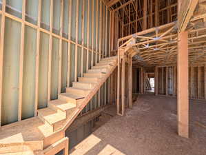 Stairwell with open to below in entrance