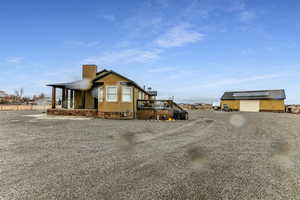 View of side of home featuring stucco siding