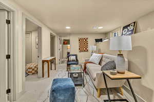 Living room featuring recessed lighting and carpet floors