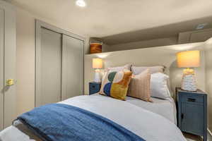 Bedroom with a closet and recessed lighting