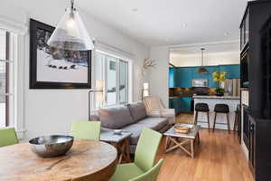 Living area featuring recessed lighting and light wood-style floors