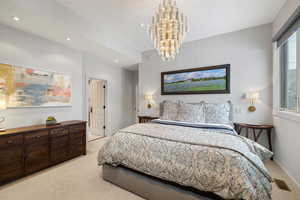 Bedroom with visible vents, recessed lighting, baseboards, light colored carpet, and a chandelier