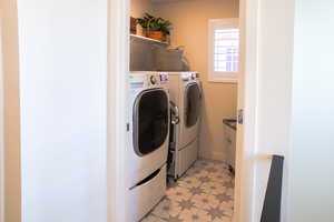 Separate washing area with laundry area & tile floors