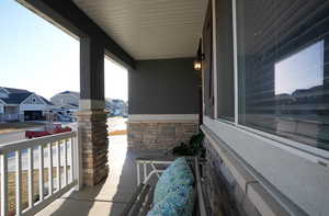 Balcony with a porch and a residential view