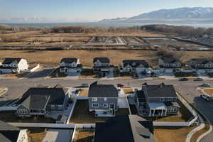 Aerial view featuring a mountain view and a residential view