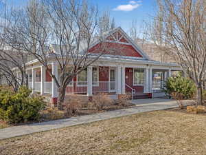 View of front of property featuring covered porch