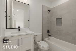 Full bathroom with tub / shower combination, toilet, and vanity